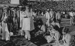 10 March 1946: Respectful Ismaili volunteers watch as their Imam, His Highness the Aga Khan III, passes by them during the Diamond Jubilee celebrations in Mumbai's Brabourne stadium.