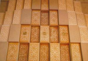 Marble Tiles with calligraphy Says Bruno Freschi: "The Jamatkhana is a very special and uniquely spiritual building. Spiritual architecture is a unique design challenge because the architecture must be simultaneously an iconic, symbolic form, complete and unequivocal yet it must transform and become ephemeral...Calligraphy is incorporated throughout the building. The spiritual voice is reflected in the graphic designs on tile work, the glass windows, carpets and wood screens. Whilst abstract the calligraphy is both traditional and spiritually evocative."