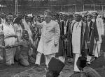 10 March 1946: His Highness the Aga Khan III accompanied by Ismaili leaders passes by a happy crowd as he leaves Brabourne Stadium in Mumbai after the Diamond Jubilee weighing ceremony