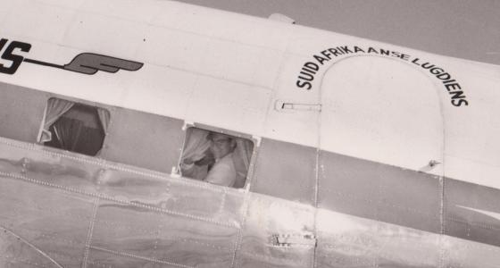 May 1958 - His Highness the Aga Khan, 49th Ismaili Imam, seen waving from a plane as he departs Lourenço Marques, Mozambique