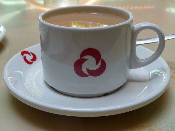 The emblem of the Aga Khan Health Services on a tea-set