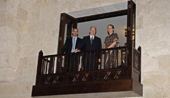 His Highness the Aga Khan, center, with his son Prince Rahim and daughter Princess Zahra overlooking the entrance hall of the Ismaili Centre Dubai from the balcony above on the opening day on March 26, 2008. Photo: akdn/Gary Otte.