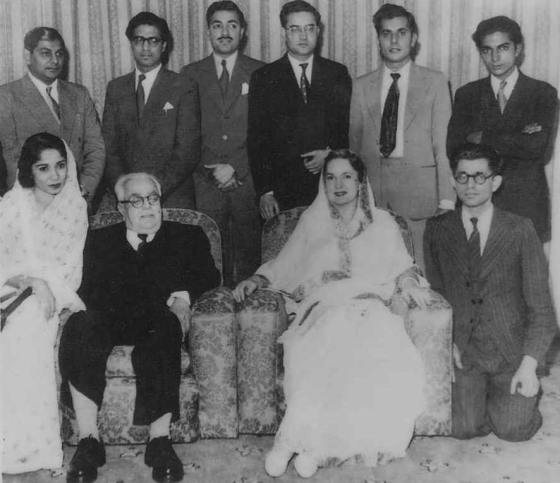 Standing L-R: Mohamed Teja (Nairobi, Kenya), Amir Aly Karim (accountant), Mohamed Jaffer (lawyer, Vazir Chhotubhai's son, Pakistan), Late Shamshudin Jaffer Ladak (Dodoma), Individual name Not available, and youthful Abdul Mamdani. Sitting L-R: Mrs. Shirin Esmail (lawyer, Uganda), Mawlana Sultan Mahomed Shah (His Highness the Aga Khan), Mata Salamat Om Habibeh Begum Aga Khan, Zool Nimji Javeri (Kamadia, London). Photo: Abdul Mamdani Collection.
