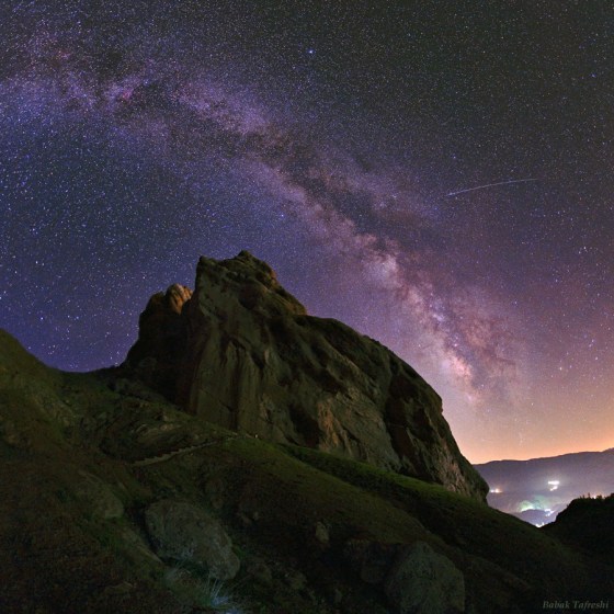 As seen on NASA's Astronomy Picture of the Day and the National Geographic News a meteor's streak and the arc of the Milky Way hang over the imposing mountain fortress of Alamut in this starry scene. Photo: Babak Tafreshi/Dreamview.net . Copyright.