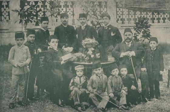 His Highness the Aga Khan III seated at left with members of his family. Photo: Late 19th century.