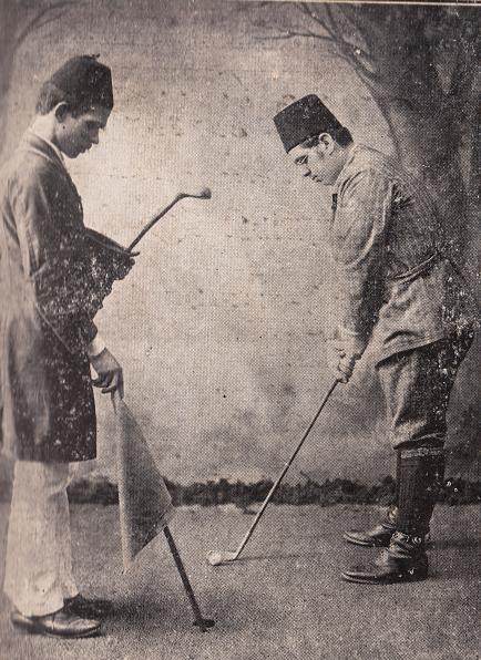 His Highness the Aga Khan gets ready to putt.