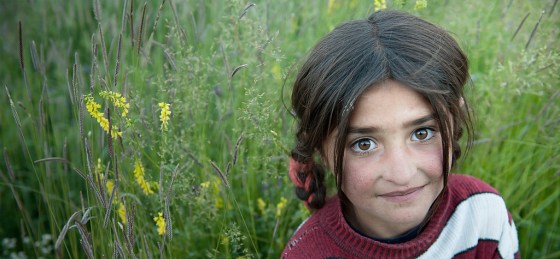 A young Ismaili girl in the grass-fields in the Wakhan corridor on the Tajikistan side. Photo: Olivier Galibert. Copyright. See Link 10 (+1) 