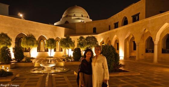 Nevin Harji, left, in a setting of calmness at the Takhtabosh Courtyard of the Ismaili Centre in Dubai.