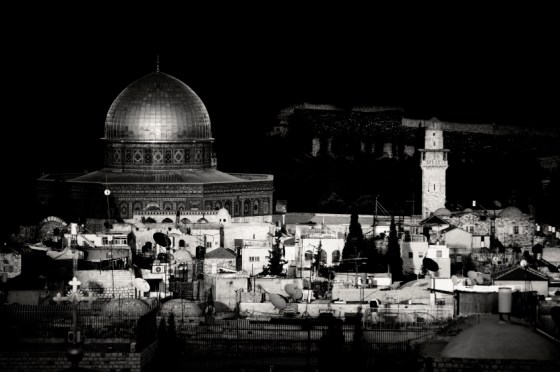 The Dome Of The Rock in Jerusalem at sunset as seen from a viewpoint in the old city. Monochrome image.
