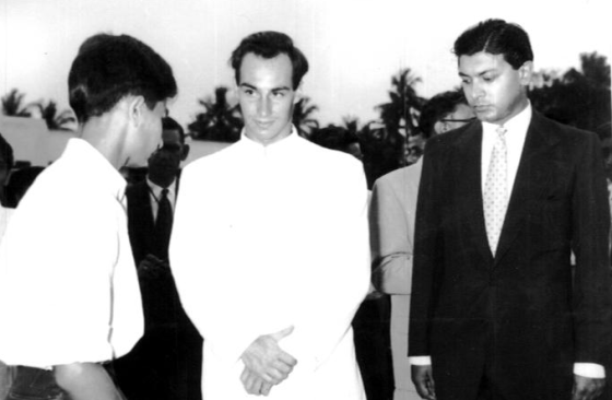 Ahamed Ismail, left, recited Qur'anic suras in the presence of His Highness the Aga Khan. The education administrator, Alnoor Kassum is at right. Photo: Ahamed Ismail Collection.