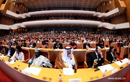 Delegates attend the International Conference on "Culture: Key to Sustainable Development" in Hangzhou, capital of east China's Zhejiang Province, May 15, 2013. The three-day conference kicked off here on Wednesday, May 15, 2003. His Highness the Aga Khan is seen second from right. (Xinhua/Xu Yu)  