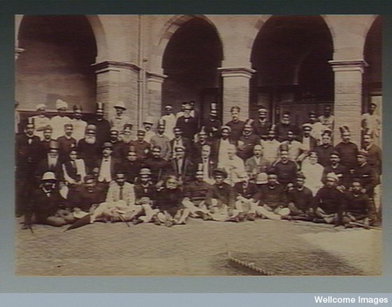 A group of people who worked as volunteers during the plague epidemic in Bombay. Photograph attributed to Captain C. Moss, 1897.