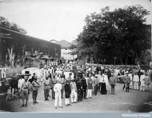 A group comprising doctors, health and public officials gathered on a street in Bombay about to begin the day's work, during an outbreak of plague. Photo Credit: Wellcome Library, London. Wellcome Images. Copyright. 