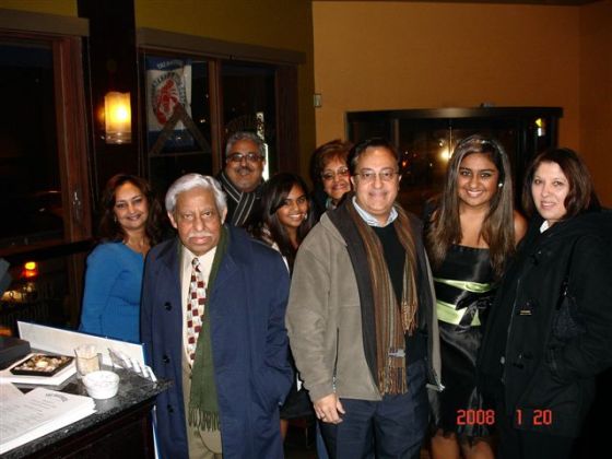 Rajabali Mecklai with members of his family during his 80th birthday party in January 2008. From left, Shaheen, Rajabali Mecklai, Karim, Keizra, Tazeem, Nasir, Safeena and Nasrin. Photo: Rajabali Mecklai Family Collection.