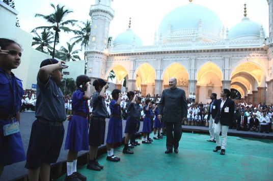 Mawlana Hazar Imam inspects Ismaili Bulbuls and Cubs standing at attention in the compound of Hasanabad in Mazagaon — the burial place of the 46th Ismaili Imam, Hazrat Aga Hasan Ali Shah, Aga Khan I. Photo: Ahmed Charania