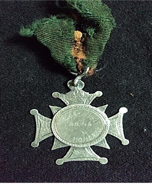 A ‘Badge of Honour’ presented to the Ismaili Scout Band in Daman.