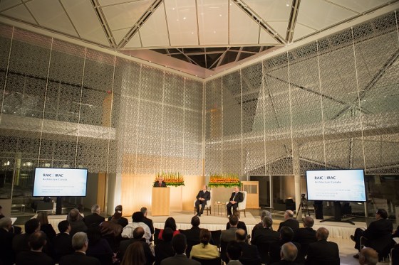 George Baird, recipient of the 2010 Gold Medal, reads the citation for the 2013 RAIC Gold Medal Award to His Highness at the Delegation of the Ismaili Imamat Building in Ottawa, as the Ismaili Imam and Paul Frank, the RAIC President, look on. Approximately 200 invited guests attended the ceremony on November 27, 2013. Photo: © AKDN/Mo Govindji.