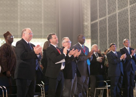 Executive members of the RAIC and Ismaili leaders, at right, Vazir Shafik Sachedina and Canada's Aga Khan Council President, Malik Talib, applaud as His Highness the Aga Khan is presented with the 2013 RAIC Gold Medal. Photo: © AKDN/Mo Govindji.
