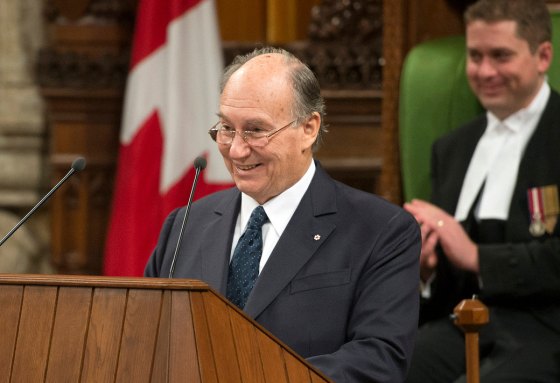 His Highness the Aga Khan seen smiling in a lighter moment  during his address to both the Houses of the Canadian Parliament on Thursday, February 27, 2014. Referring to the two gold medals won by the Canadian hockey teams in the Sochi Olympics, the Ismaili Imam remarked, "As an ex-player myself I was hoping you would require your honorary citizens to join your team. I am convinced that the Dalai Lama and I would have been a formidable defence.  Photo credit : The Office of the Prime Minister of Canada.
