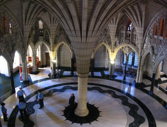 The Rotunda, also called the Confederation Hall, is the formal entrance to Centre Block. Its grandeur immediately reveals the significance of the building and the institutions it houses. It welcomes visitors with an elaborate representation of Canada's political landscape. With carved and sculpted symbols of every province and territory, it also welcomes every Canadian home. Photo: Wikipedia. 