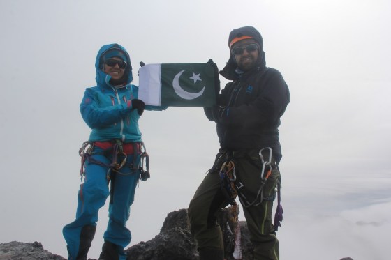 Samina Baig and and Mirza Ali at summit of Indonesi'a Mt. Puncak Jaya (4884m), also known as Carstensz Pyramid, the highest mountain in the continent of Australia. They reached the summit on March 19, 2014. Photo: Samina Baig Facebook page.