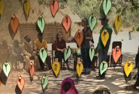 Children exchange their ideas and thoughts on global matters on these little leaves. They are invited to take away with them any leaf containing the though of another child. When the leaf is cut open at home it contains wild flower seeds that children can plant in their gardens. Photo: Malik Merchant/Simerg. 