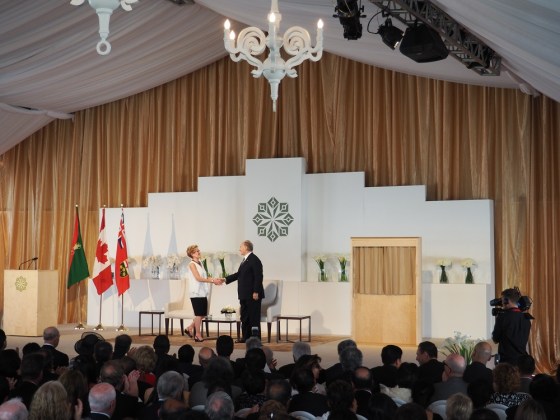 Mawlana Hazar Imam congratulates Premier Kathleen Wynne after the completion of her speech at the opening of the Aga Khan Park on May 25, 2015. Photo: Simerg/Malik Merchant. Copyright.