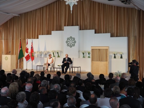 Mawlana Hazar Imam gathers his speech before rising to speak to the audience at the opening of the Aga Khan Park on May 25, 2015. Photo: Simerg/Malik Merchant. Copyright.