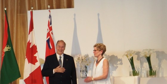 Mawlana Hazar Imam graciously accepts the standing ovation he receives after completing his speech at the opening of the Aga Khan Park on May 25, 2015. Photo: Simerg/Malik Merchant. Copyright.