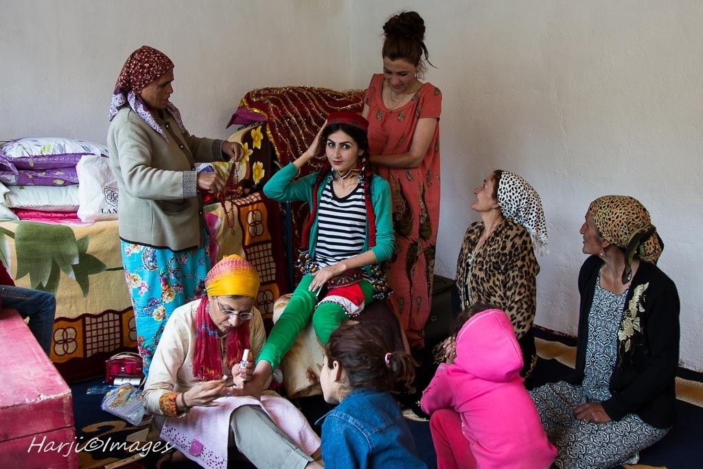 A bride-to-be is pampered with a manicure and pedicure before her wedding in a small village in the Pamirs.   Please click on image for Muslim Harji's photo essay. 