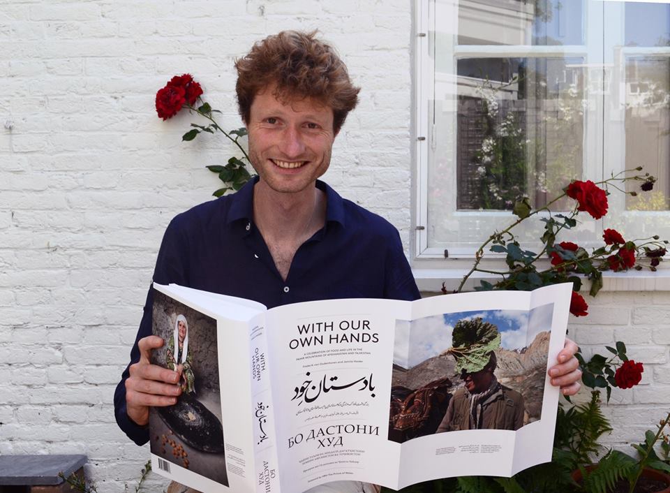Frederik van Oudenhoven happily displaying “With Our Own Hands” that he co-authored with Jamila Haider. Photo: Facebook page, PamirFoodandLife. The magnificent volume is now out of print, but may be obtained through resellers at Amazon. 
