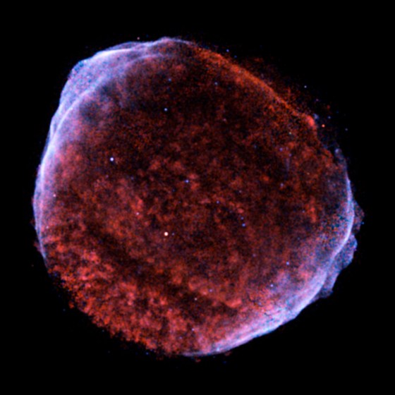 Chandra's image of SN 1006 shows X-rays from multimillion degree gas (red/green) and high-energy electrons (blue). In the year 1006 a "new star" appeared in the sky and in just a few days it became brighter than the planet Venus. We now know that the event heralded not the appearance of a new star, but the cataclysmic death of an old one. It was likely a white dwarf star that had been pulling matter off an orbiting companion star. When the white dwarf mass exceeded the stability limit (known as the Chandrasekhar limit), it exploded. Material ejected in the supernova produced tremendous shock waves that heated gas to millions of degrees and accelerated electrons to extremely high energies.