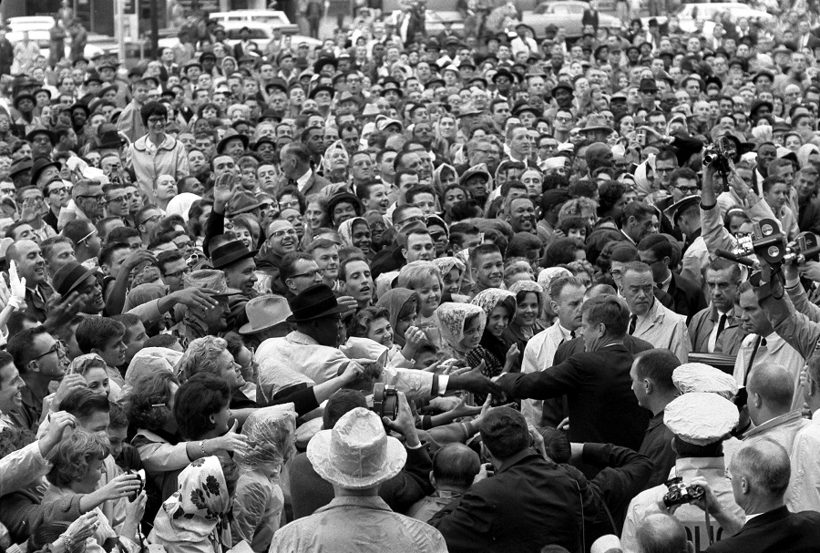 President Kennedy reaches out to crowd in Texas, photo reproduced in Simerg