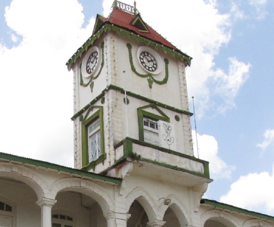 Aga Khan Ismaili Iringa Jamatkhana close-up of bell clock, Simerg