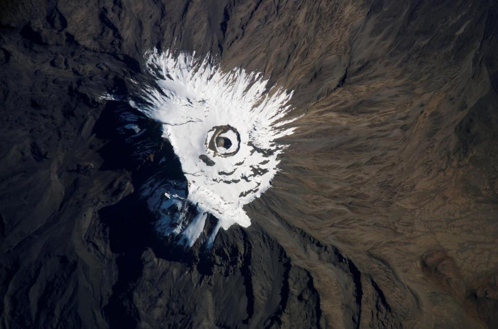 This image taken by EO-1’s Advanced Land Imager (ALI) on Jan. 20, 2017, shows snowcap of the volcanic Mount Kilimanjaro Tanzania Karim Karim article simerg